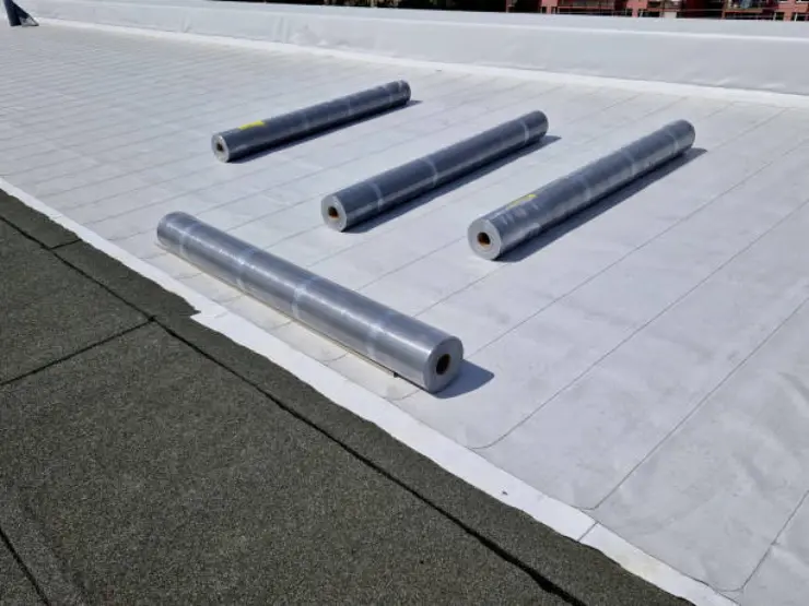 Various materials used for installing a waterproof membrane for roof protection.